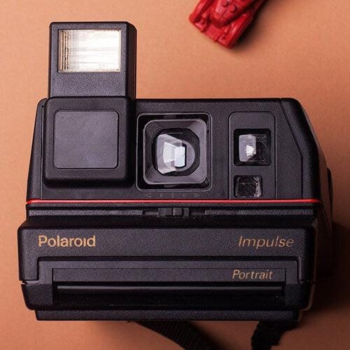 Polaroid impulse portrait instant film camera - classic vintage point and shoot - Vintage Polaroid Instant Cameras