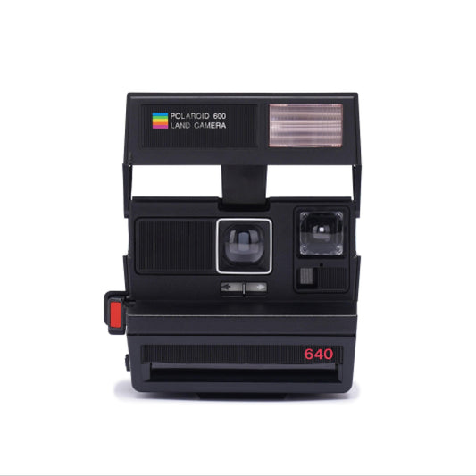 Vintage polaroid 640 instant camera - classic 600 film camera with built-in flash, fixed focus lens, lighten/darken control for retro photos