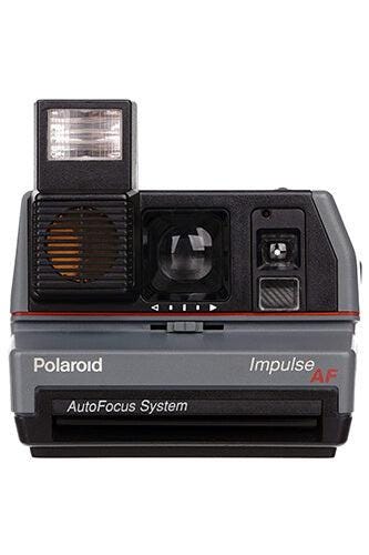 Polaroid impulse portrait instant film camera, vintage autofocus af, retro instant photography, classic 80s instant camera