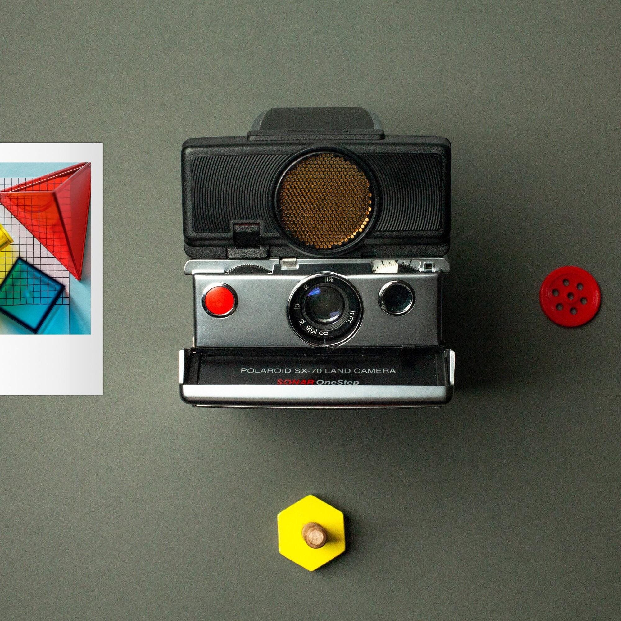 Vintage Polaroid SX-70 Sofortbildkamera Sonar Silber/Schwarz Landcamera Polaroid Autofokus