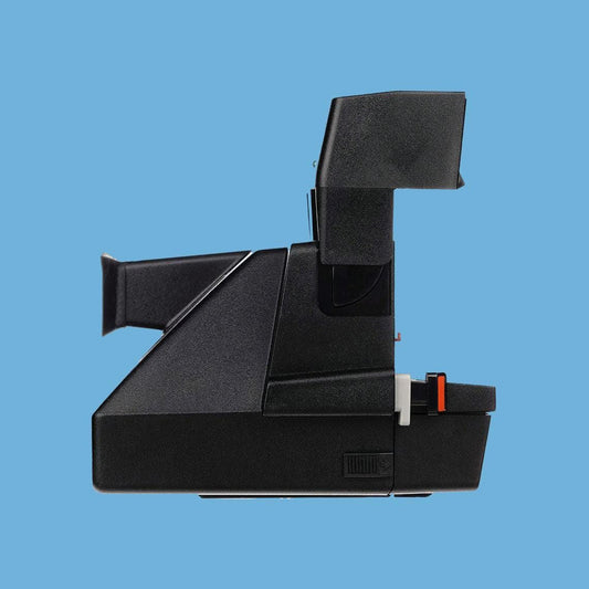Polaroid 600 business edition instant camera, vintage polaroid 600 type, retro instant camera, classic polaroid camera, collectible camera