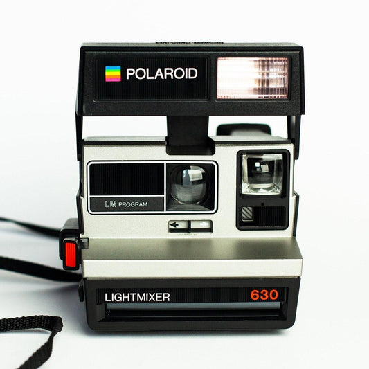 Vintage polaroid 630 lm silver instant film camera – 600 film, light mixer, built-in flash, classic retro photography, fully tested