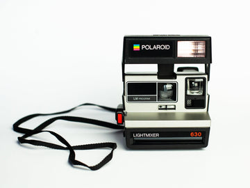 Vintage polaroid 630 lm silver instant film camera – 600 film, light mixer, built-in flash, classic retro photography, fully tested